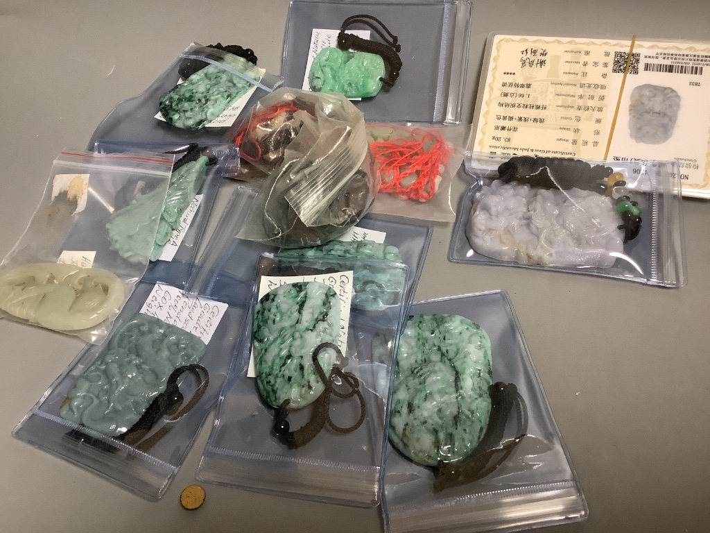 Assorted Chinese pendants and bangles, etc